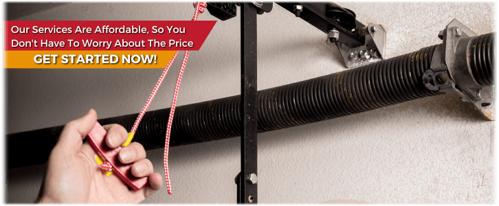 Broken Garage Door Spring Greenfield IN